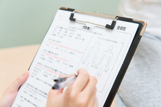 国家資格者が問診する様子